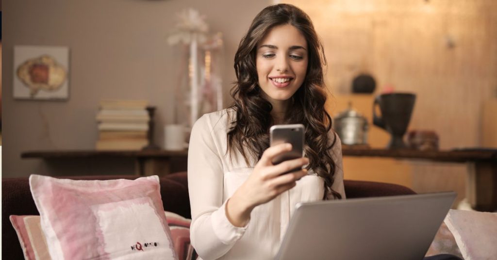 Signs Online Dating is For You | Girl on phone and laptop