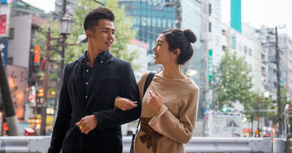 Couple Walking in City