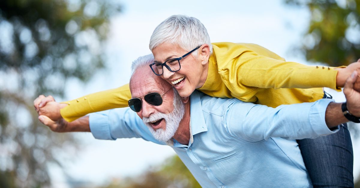 Elderly couple smiling together