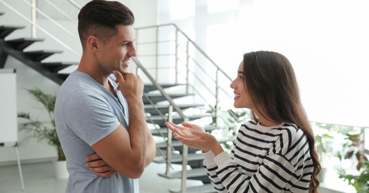 Questions to ask when you want to know more | Couple talking and smiling