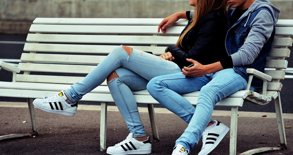 Couple Sitting on Bench