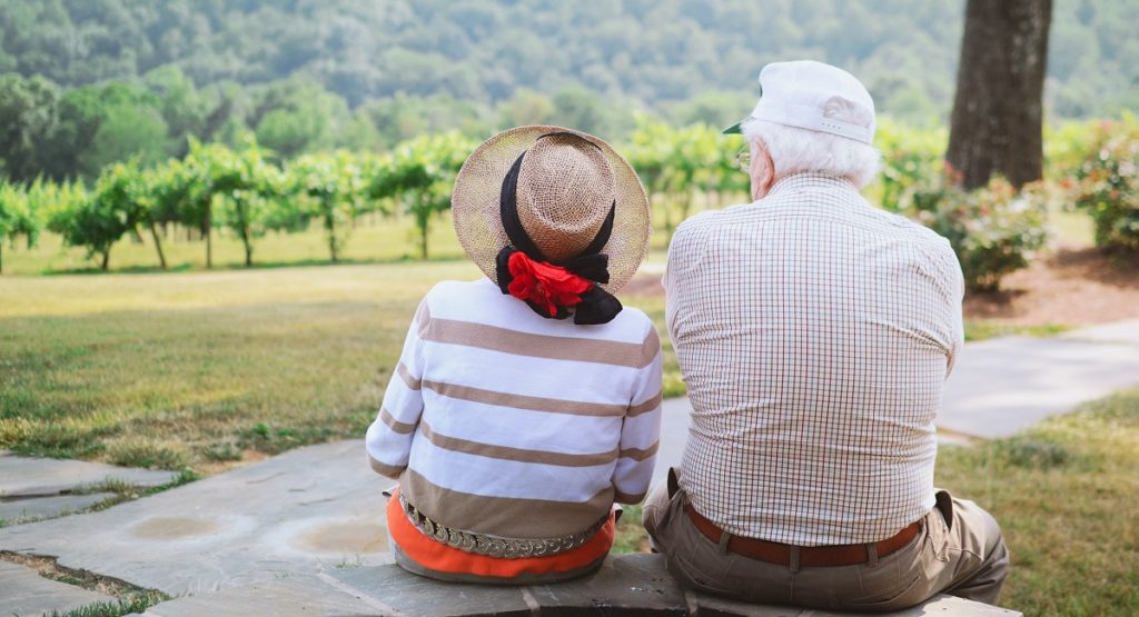 Senior Couple Sitting on Bench