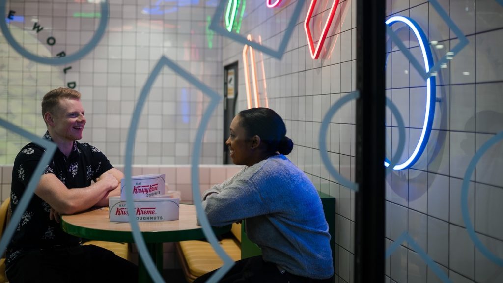 Couple Talking at Restaurant
