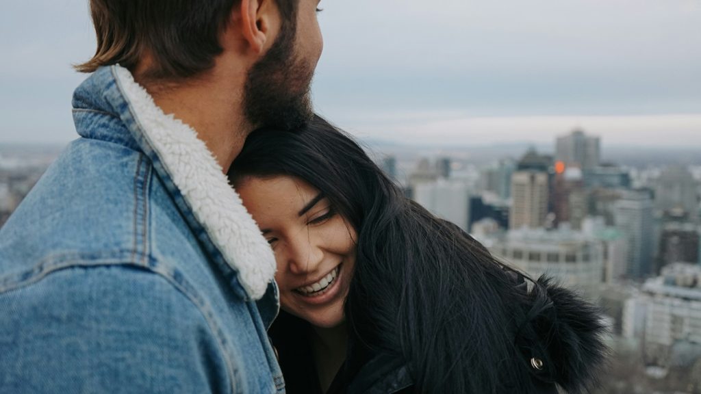 Man Hugging Woman
